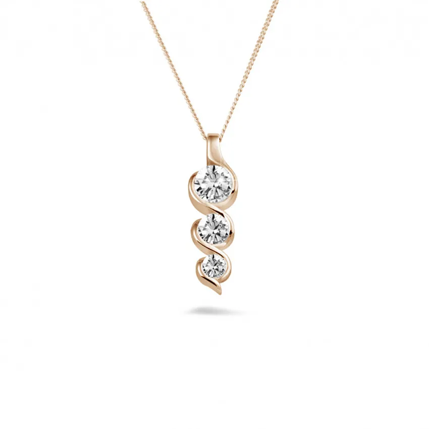 0.57 quilates trilogía colgante diamante en oro rojo 