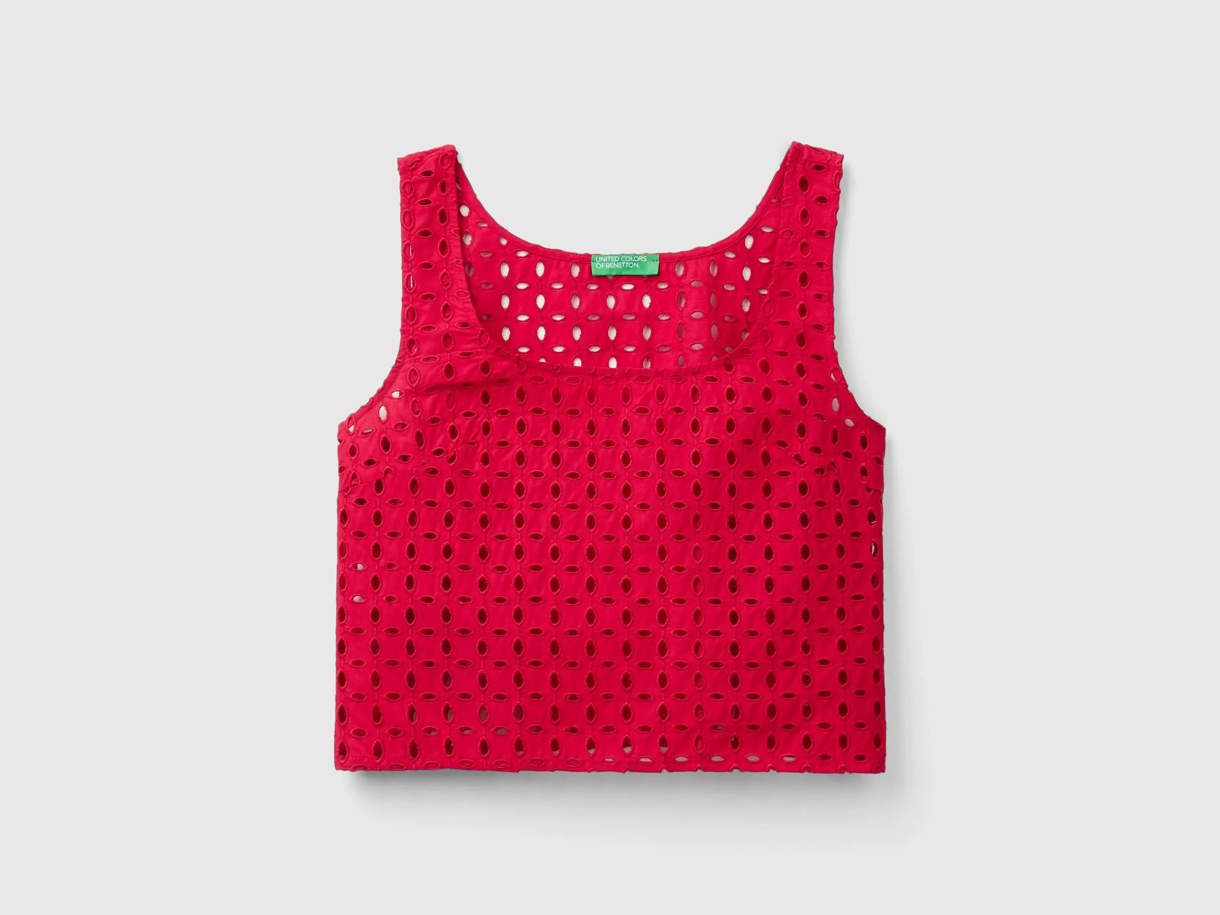 Blusa de encaje suizo sin mangas