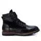 Botines Carmela 067519 negros con detalles en ante