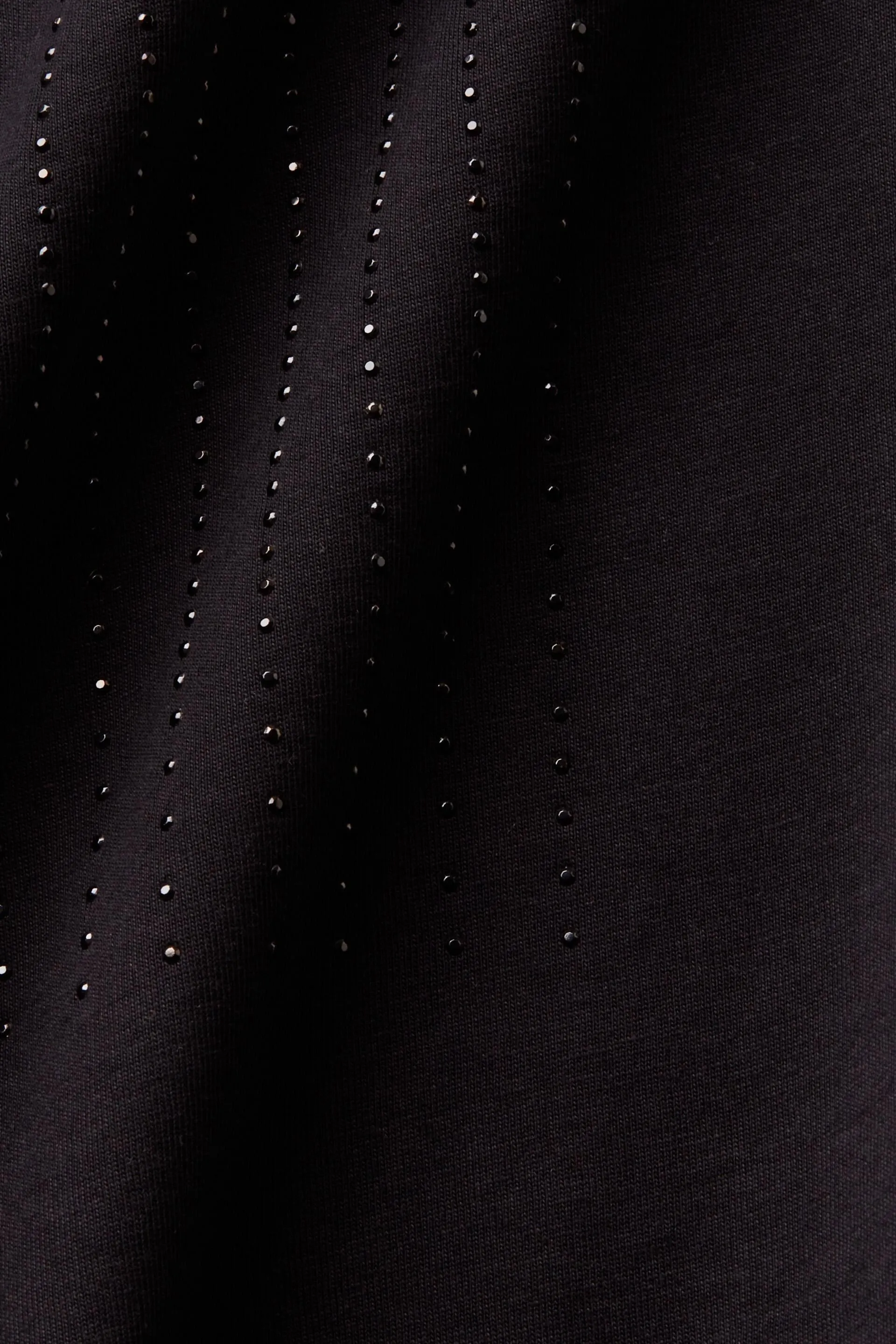Camiseta de jersey con piedras brillantes