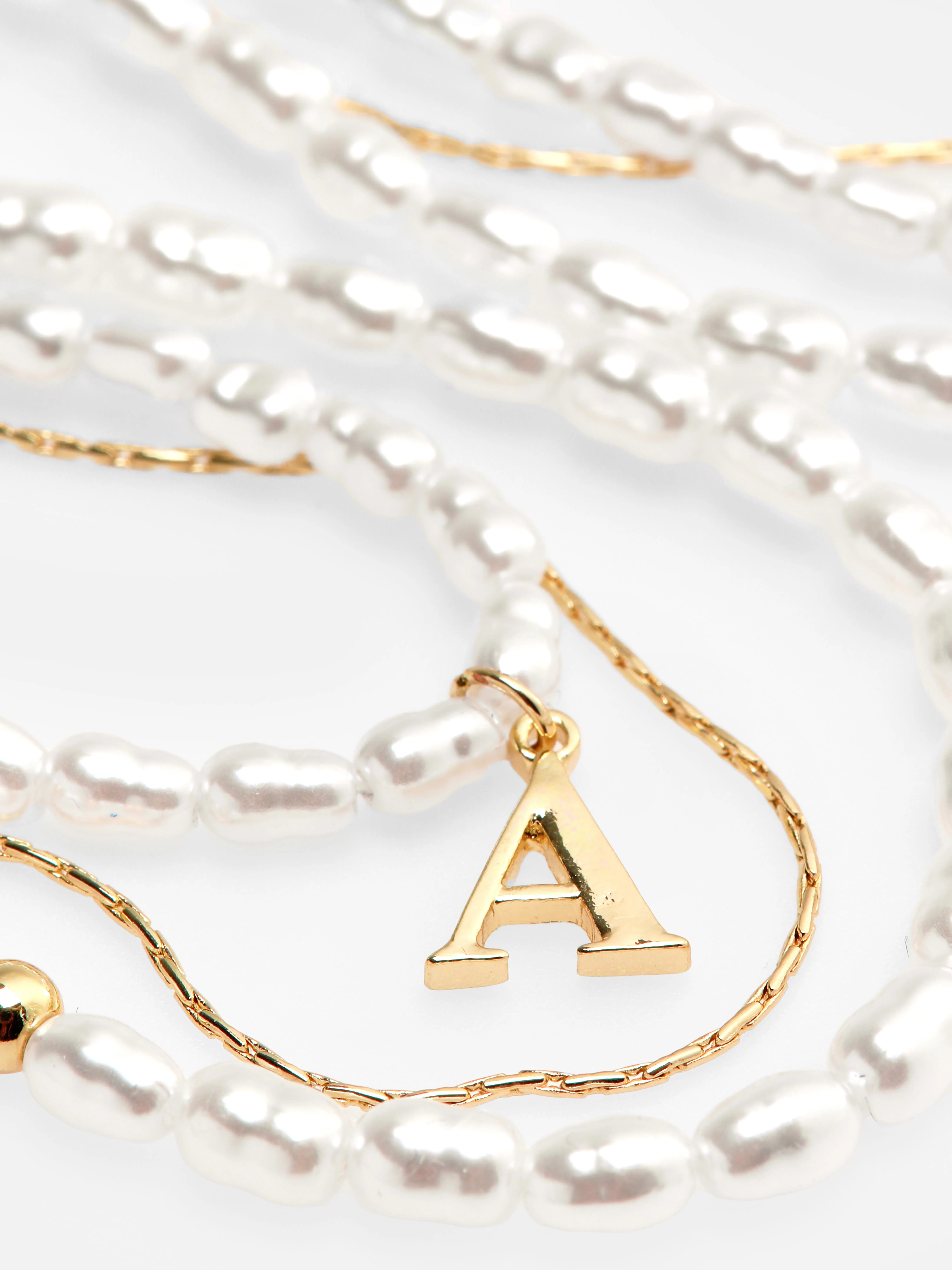 Collar de triple cadena con inicial
