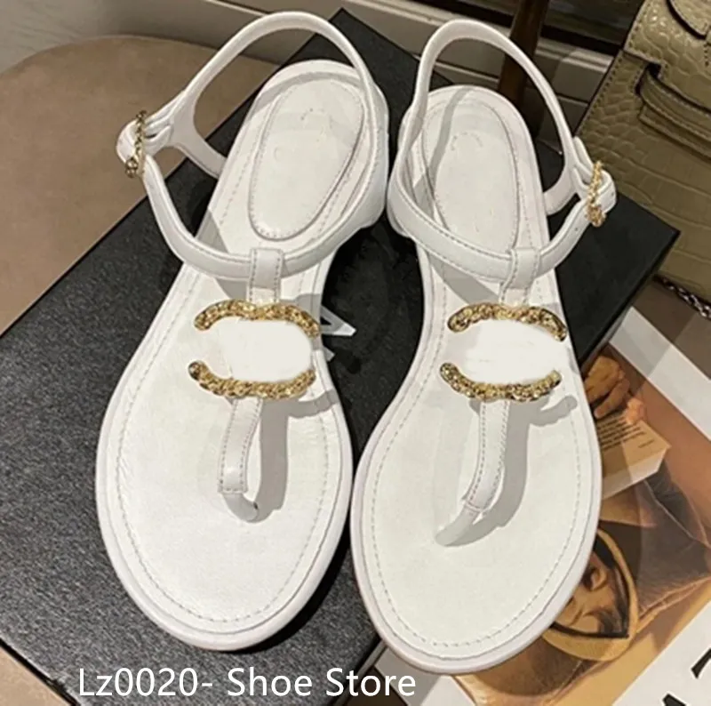 Diseñador de moda francés Zapatillas de mujer Zapatos planos con punta abierta Verano T Atar Zapatos de marca para mujer Playa C