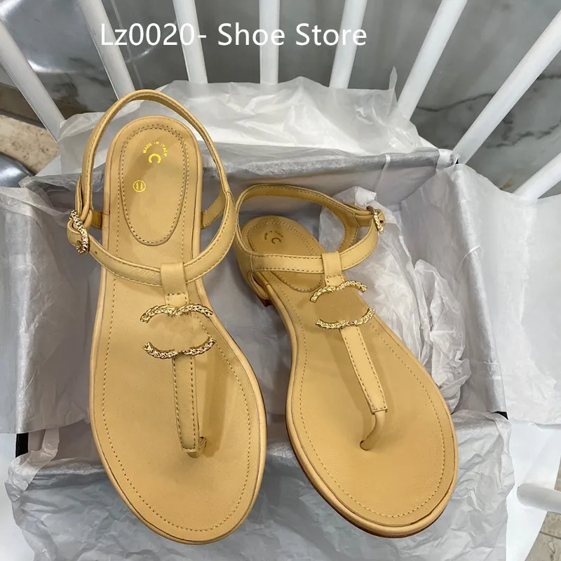 Diseñador de moda francés Zapatillas de mujer Zapatos planos con punta abierta Verano T Atar Zapatos de marca para mujer Playa C