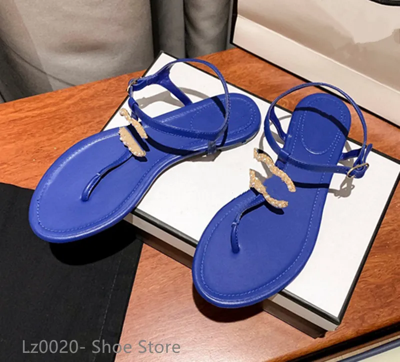 Diseñador de moda francés Zapatillas de mujer Zapatos planos con punta abierta Verano T Atar Zapatos de marca para mujer Playa C