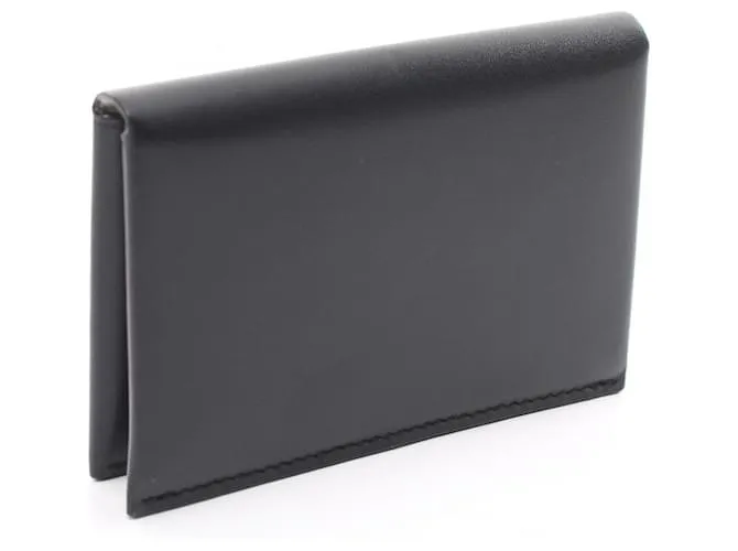 Estuche de tarjetas de visita de cuero negro Yves Saint Laurent 
