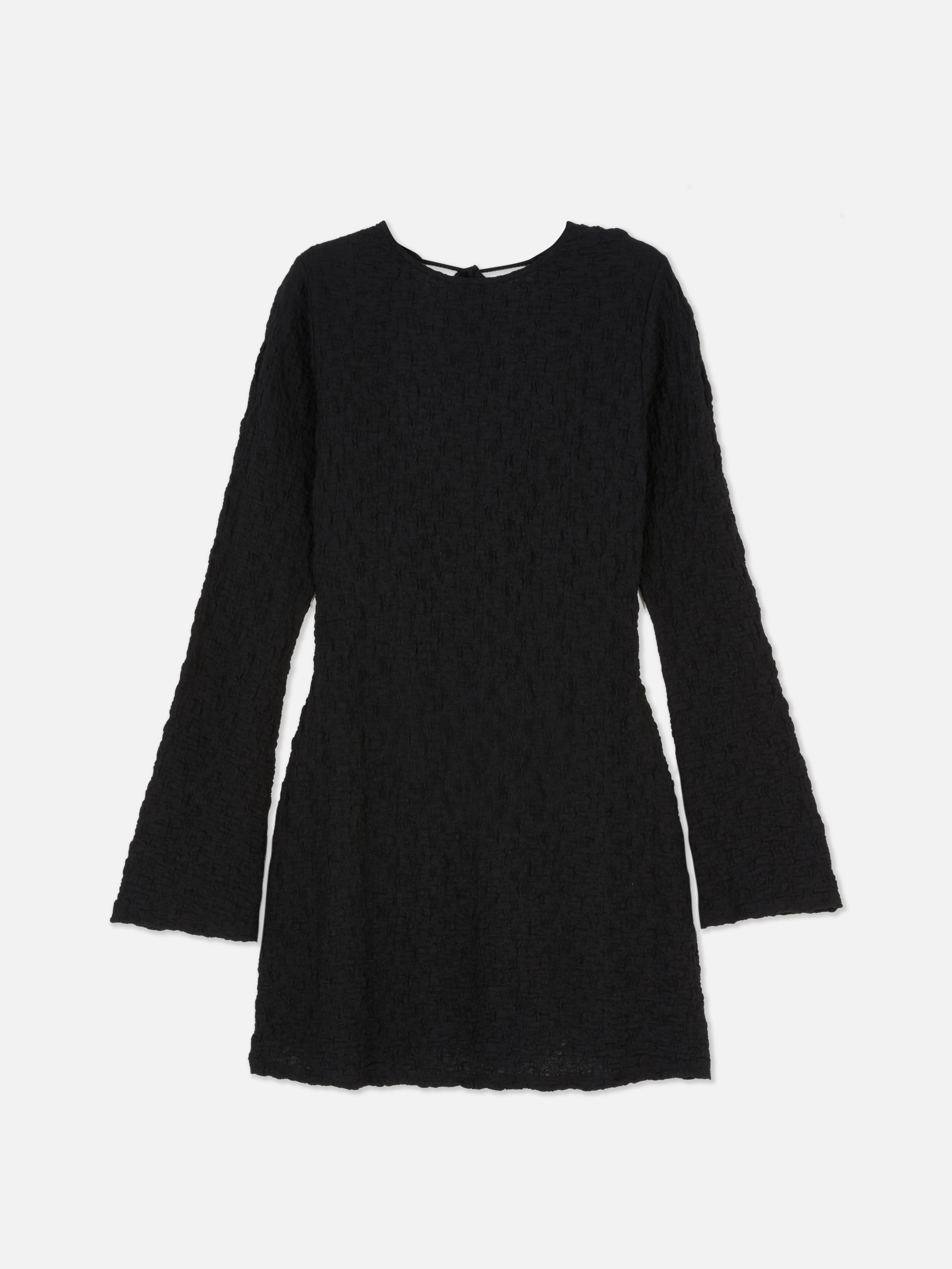 Vestido corto de manga larga con textura