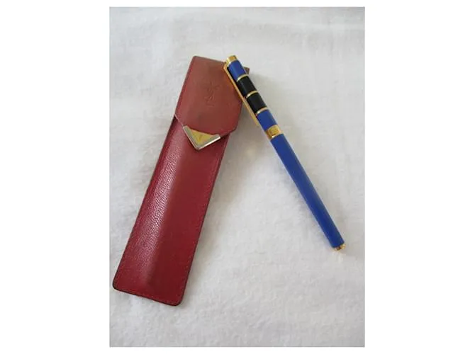 Yves Saint Laurent Bolígrafo con estuche de cuero. Gold hardware 